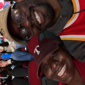 2023: Dragging Fola to a Rocket's game. 
Still trying to convince her on being a Rocket's Fan