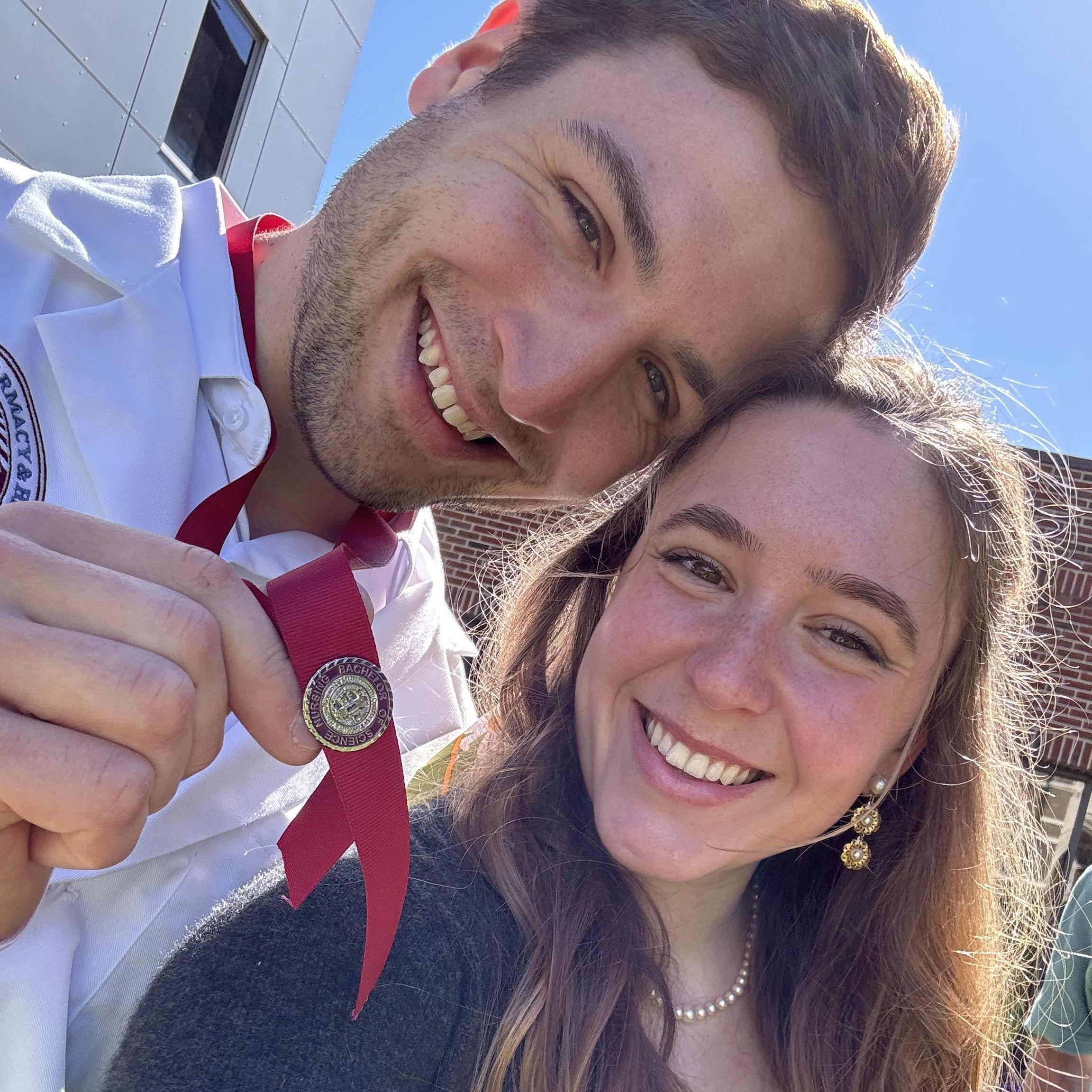 Now Dan graduates from nursing school!