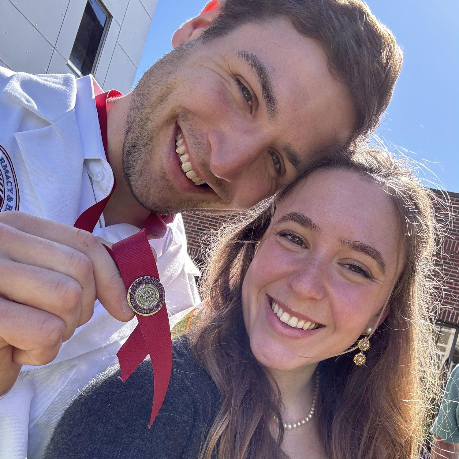 Now Dan graduates from nursing school!