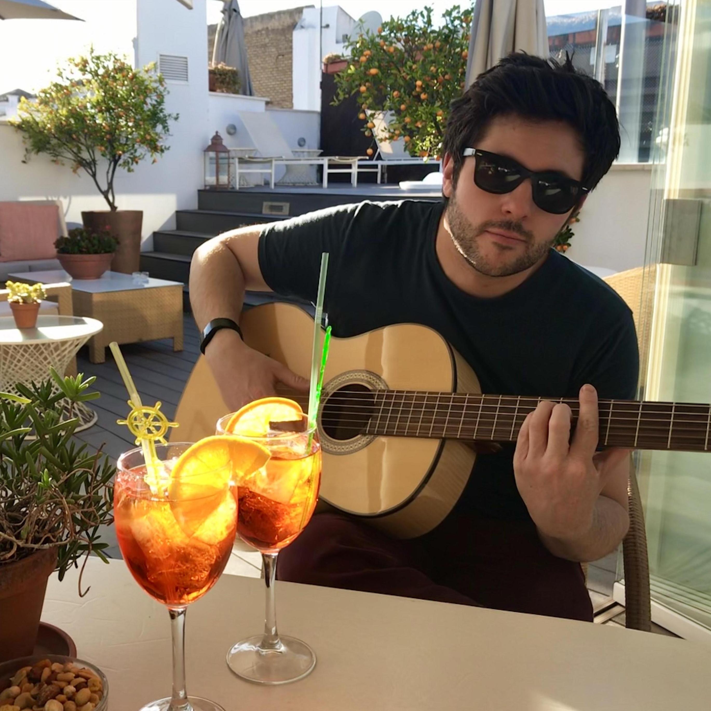 Enjoying rooftop Aperols at Hotel Amadeus in Seville, Spain - instruments in every room for guests to play!
2019