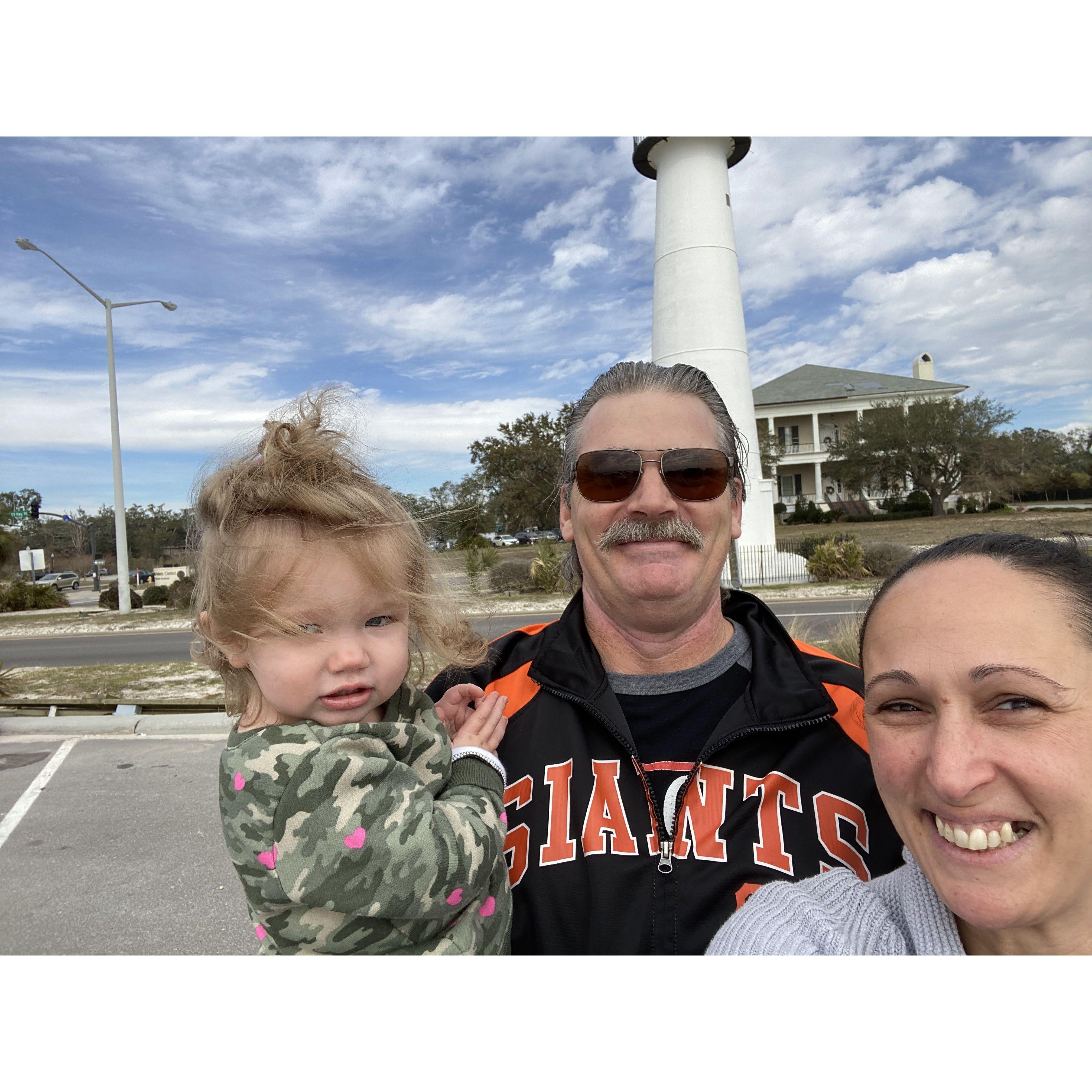 Biloxi lighthouse with grandbaby Addy