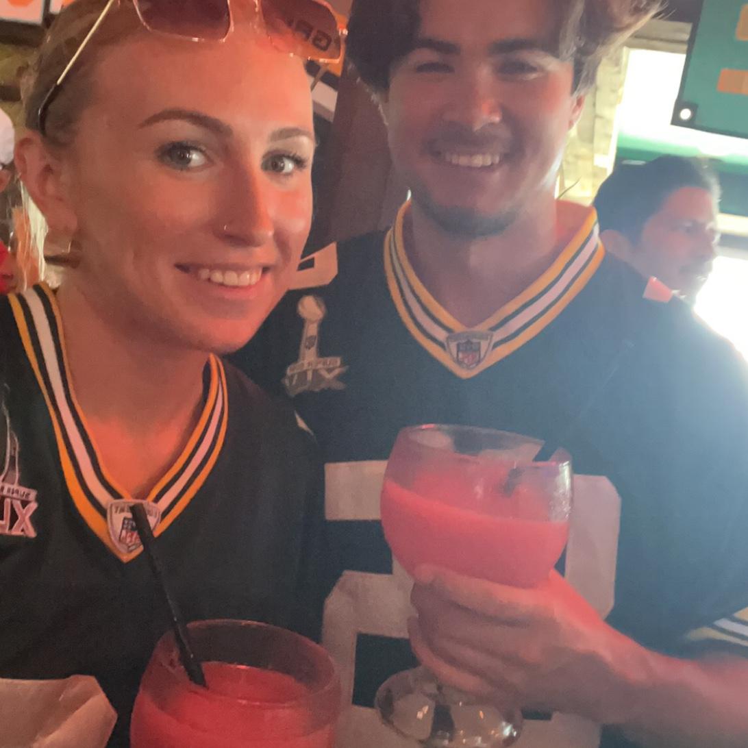 Calvin turning Amber into a football watcher! At least he roots for her home team;), Go Pack Go!