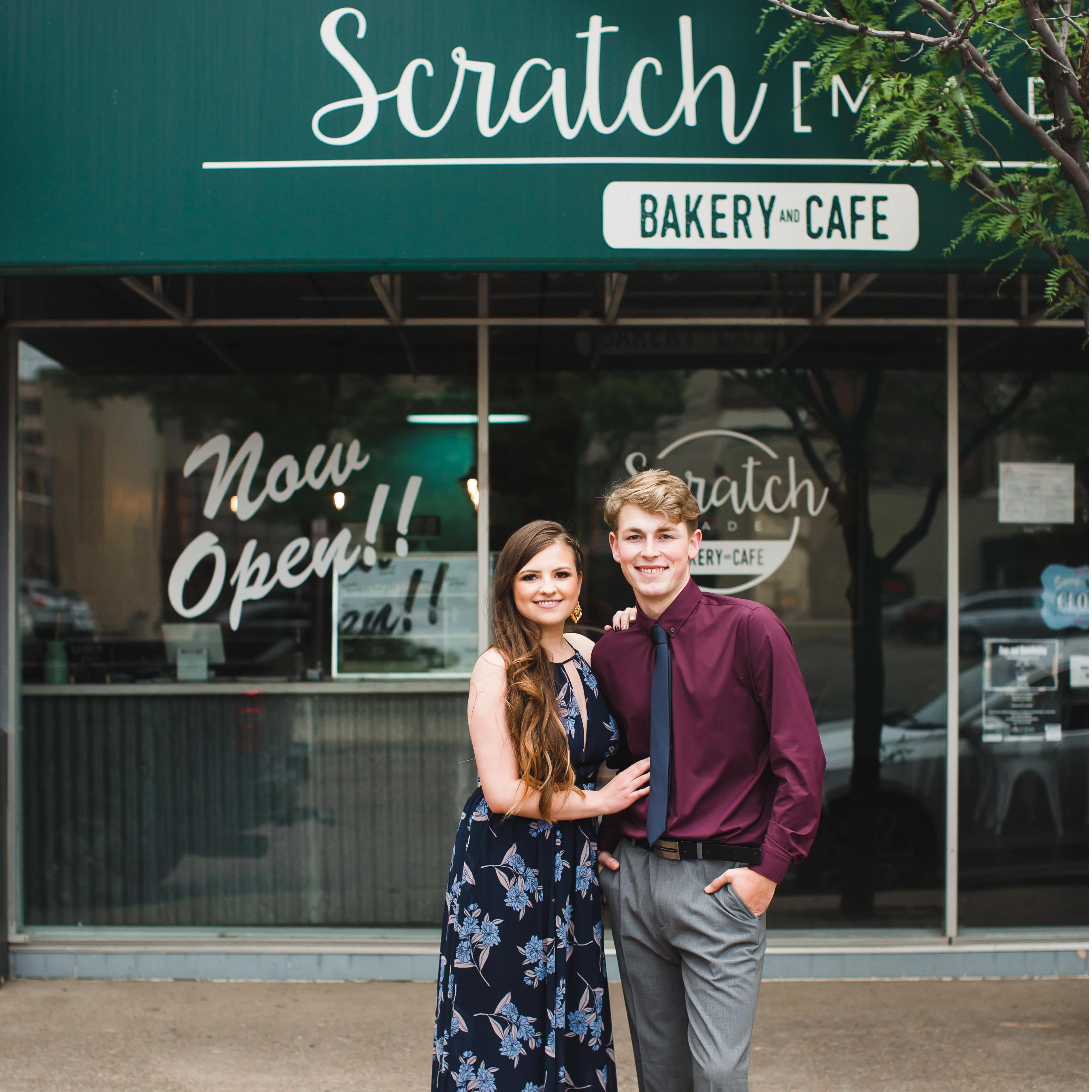 Engagement photos taken by Kayla Smith Photography in front of Scratch Made Bakery in Downtown Amarillo. Scratch Bakery has been our favorite bakery since we found it in 2015.