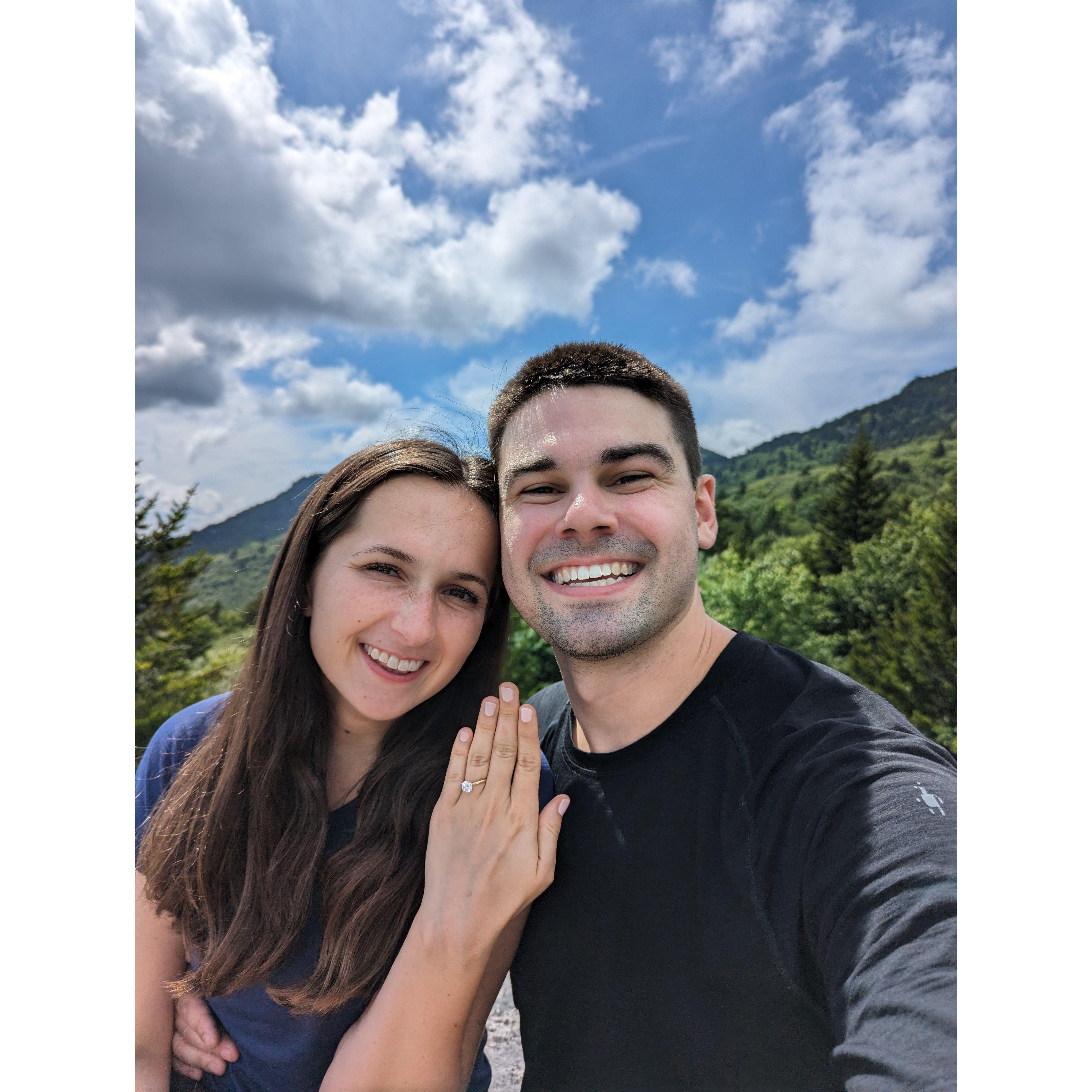 The proposal at Grandfather Mountain! This was one of our first pictures, taken on the boulder where Hampton proposed!