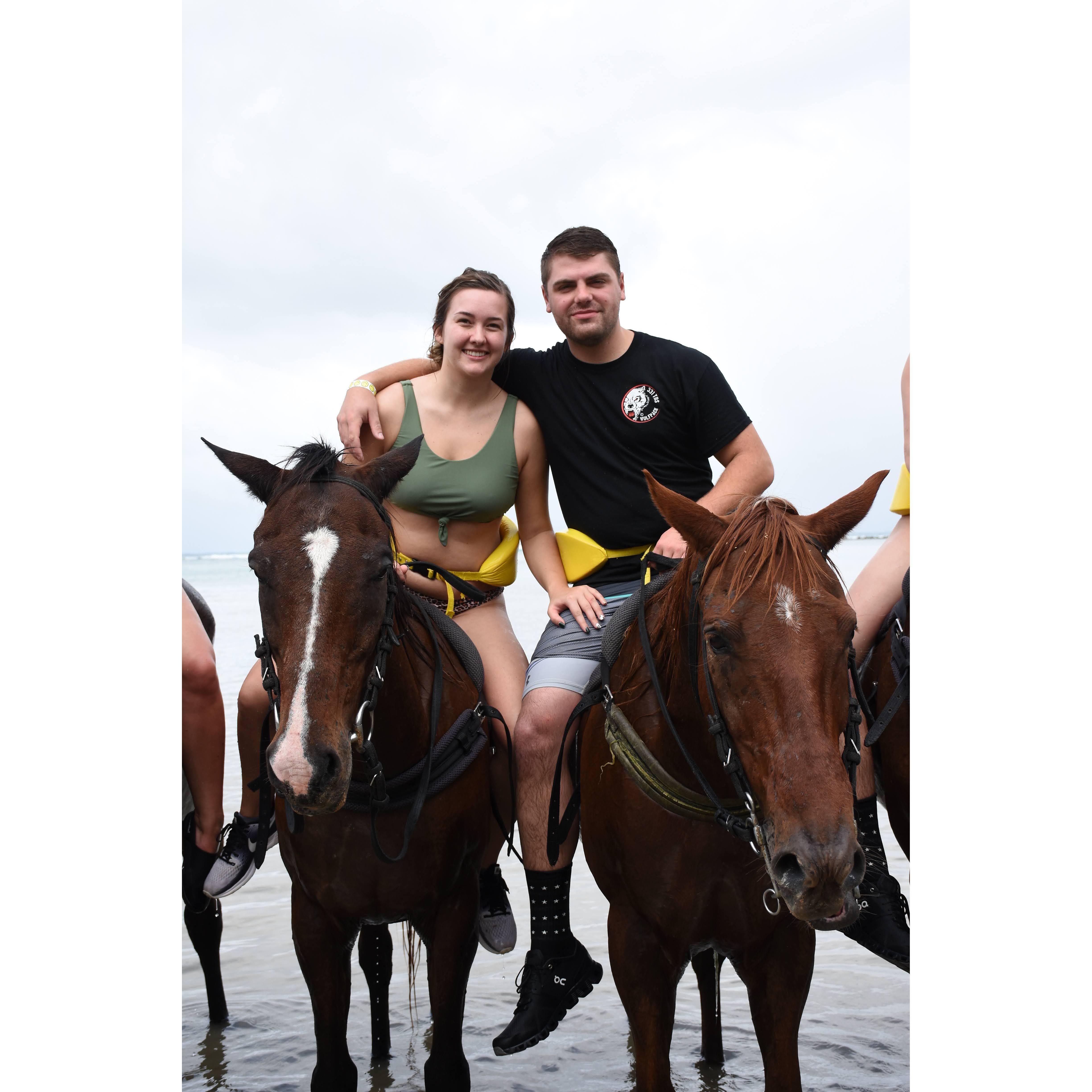 Horseback riding in the ocean during a trip to Jamaica in 2020.