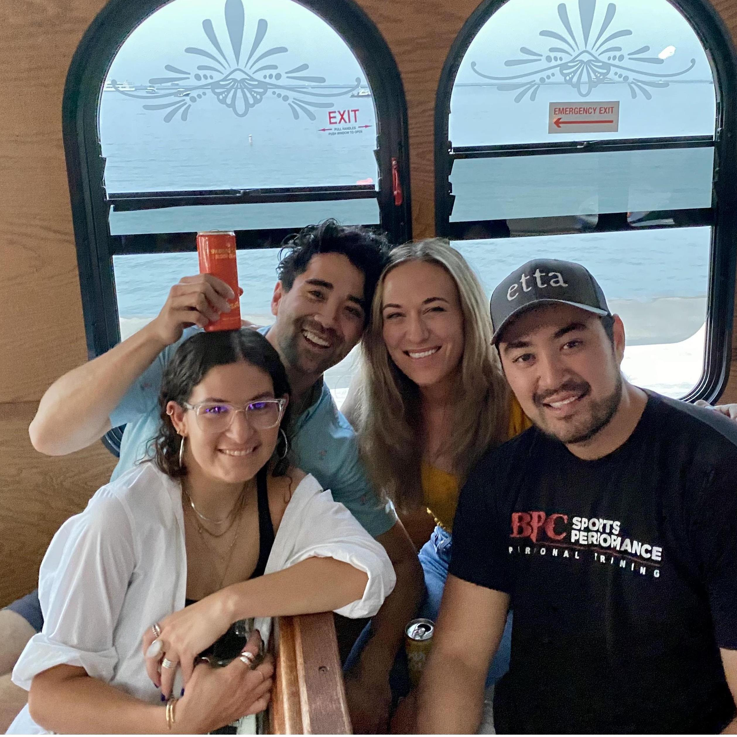 Matt and Hayley along with their younger siblings, Reese and Kai, on a party trolley in Chicago.