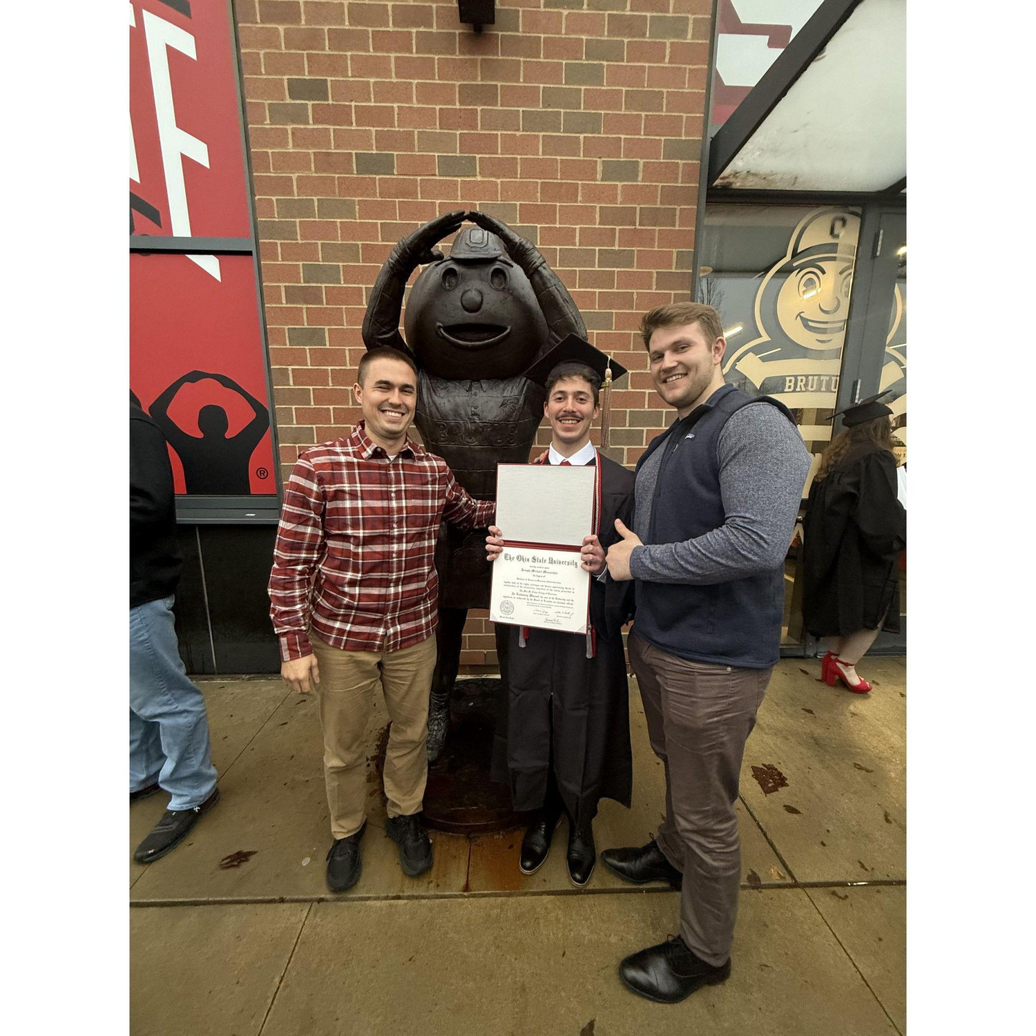Paul supporting Olivia's brother, Joe, at his OSU graduation!