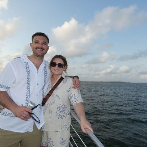 Us in a boat in Florida looking for dolphins
