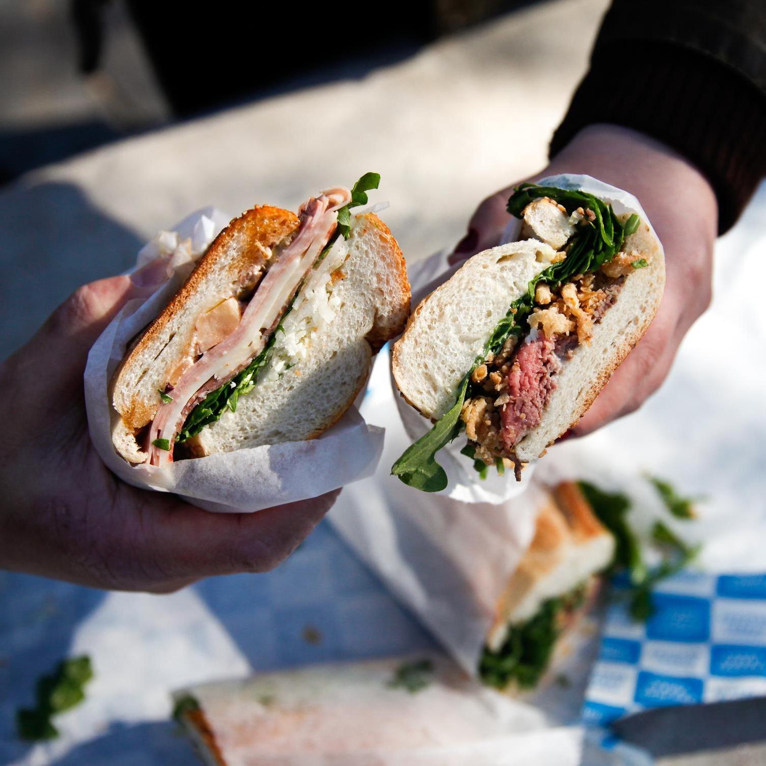 The Droopy and Italian Combo from Court Street Grocers, enjoyed al fresco in nearby Carroll Park.