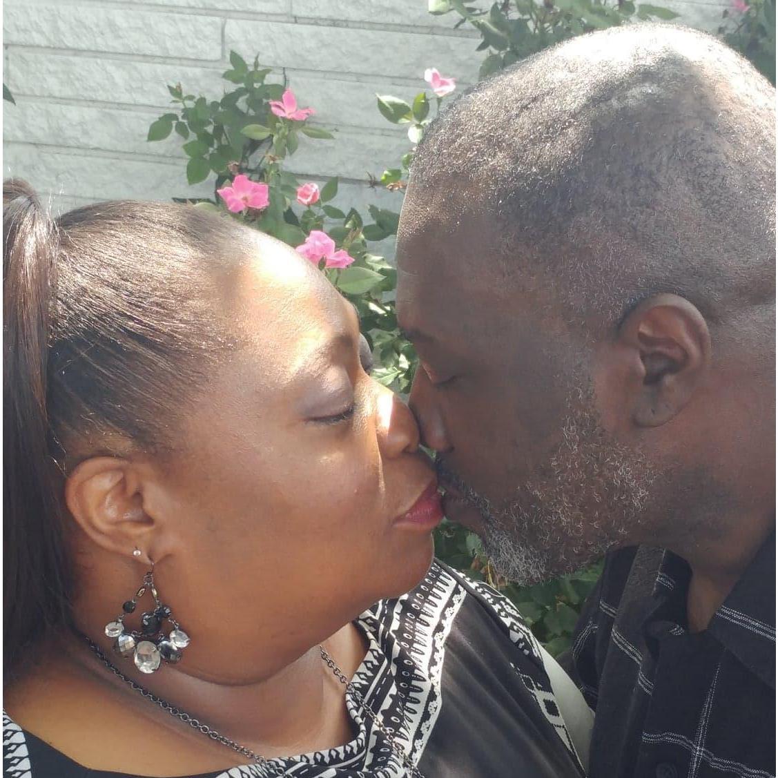 Sharing a quiet kiss in the Garden