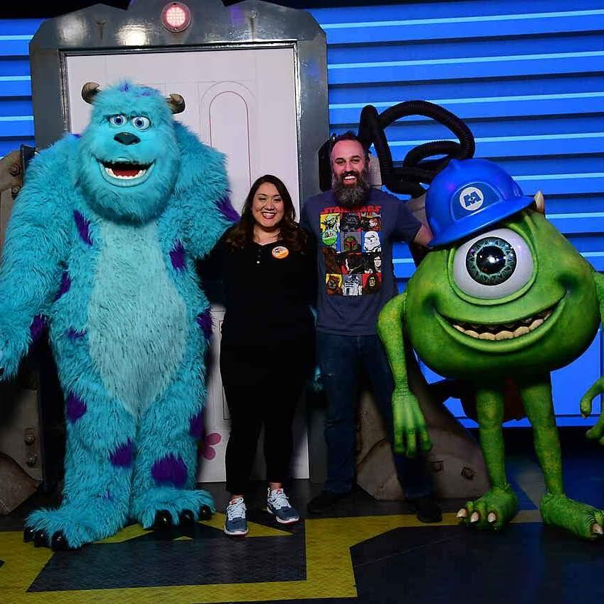 With Alyssa's favorite Pixar stars, Mike & Sully. Alyssa almost cried. Sully told Andrew he liked his beard.