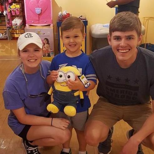 Wyatt celebrating his birthday at Build-a-Bear with Uncle Cay Cay and Caroline