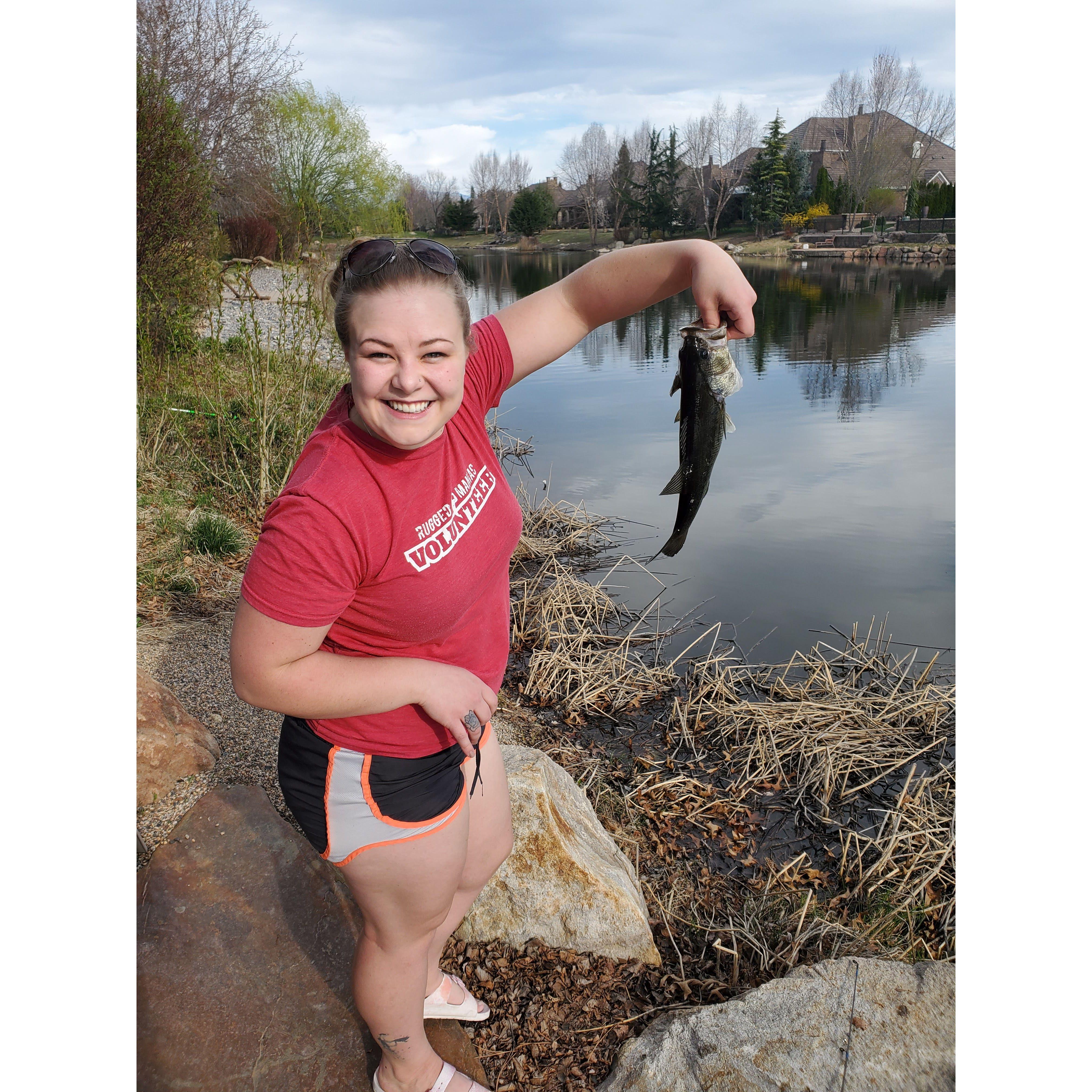 Drew taught Lyndsey how to fish, and this was the first Bass she caught