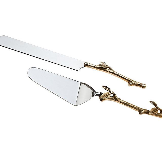 2 Piece Gold leaf (twig) Cake Server Set. 1 Cake Knife and 1 Cake Server. Leaf Design 2 Tone Made of Stainless Steel and Brass. Ideal for Weddings, Party's, Elegant events.