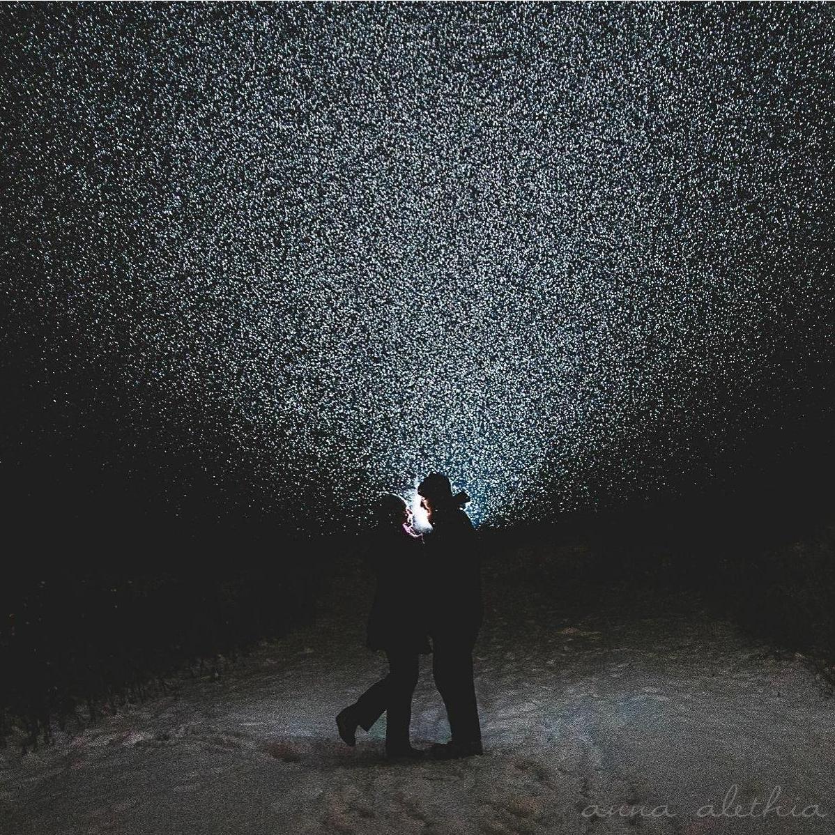 I took this photo of us while experimenting with off camera flash one snowy night.