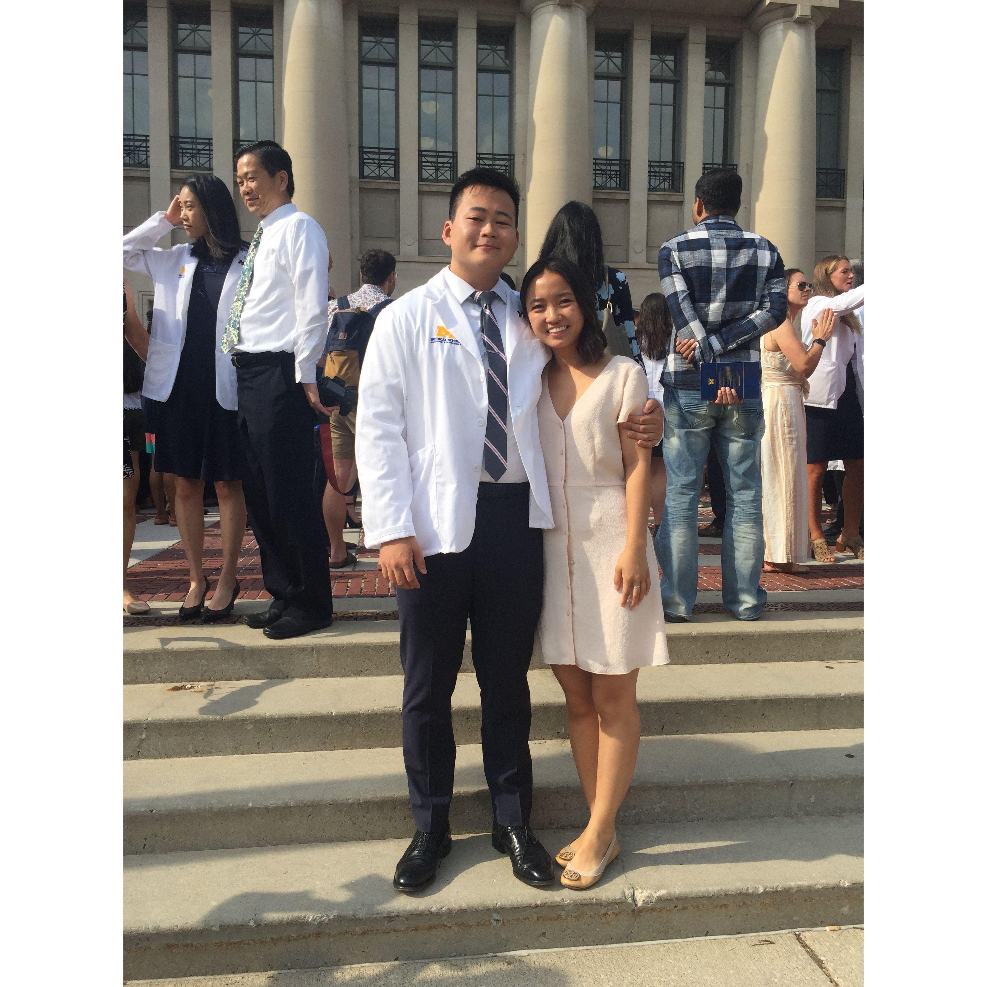 At Daniel's white coat ceremony at the beginning of medical school at UofM