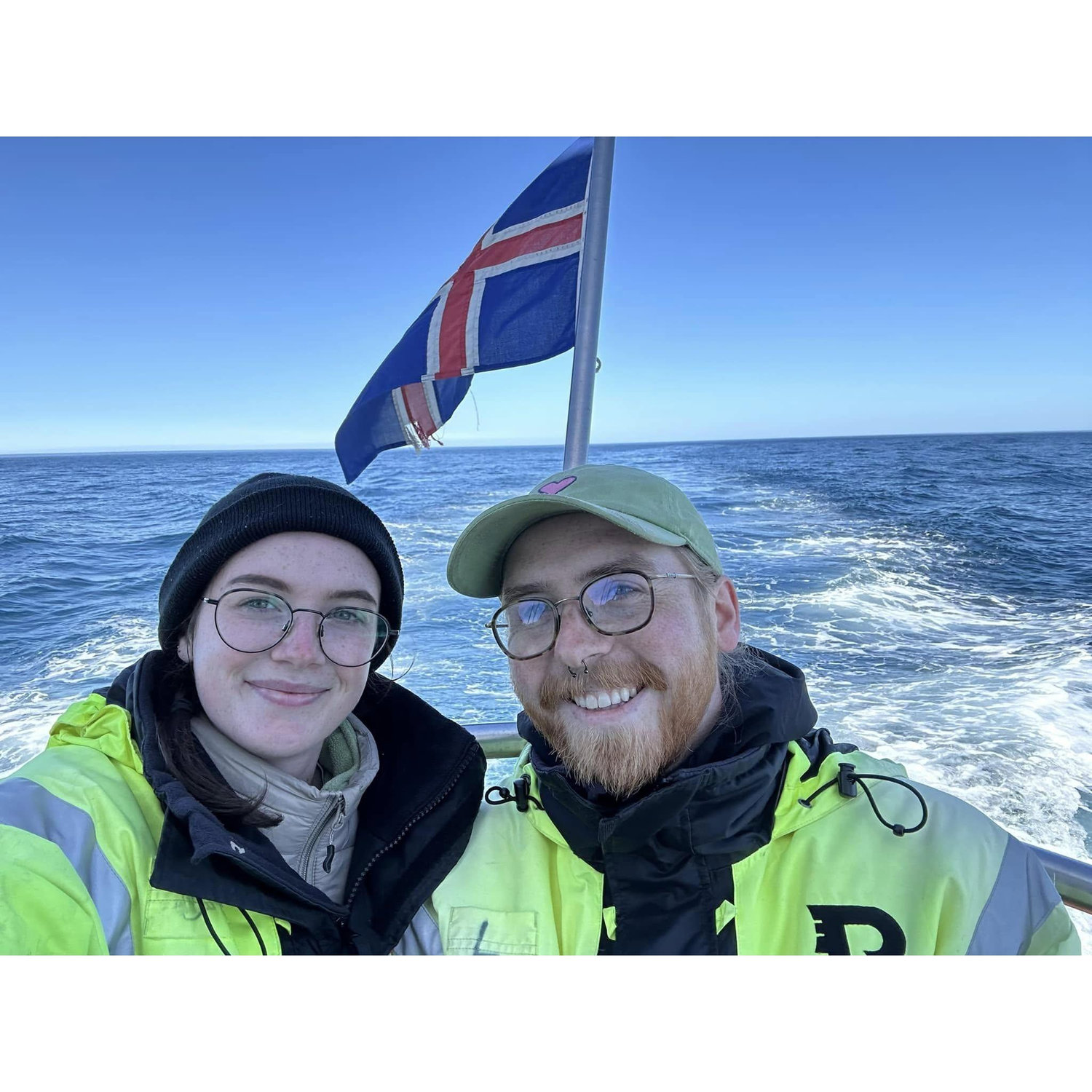Here we are off the coast of Húsavík on a whale watching tour, looking very sun-kissed during our trek through Iceland, 2024