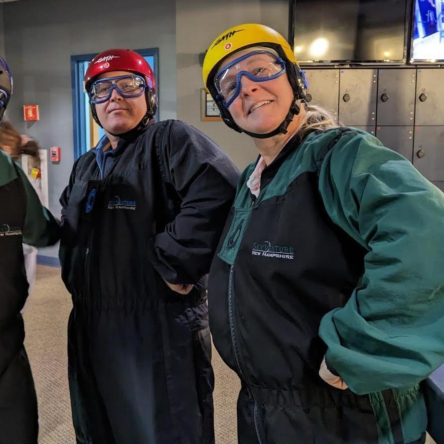 In our skydiving outfits.