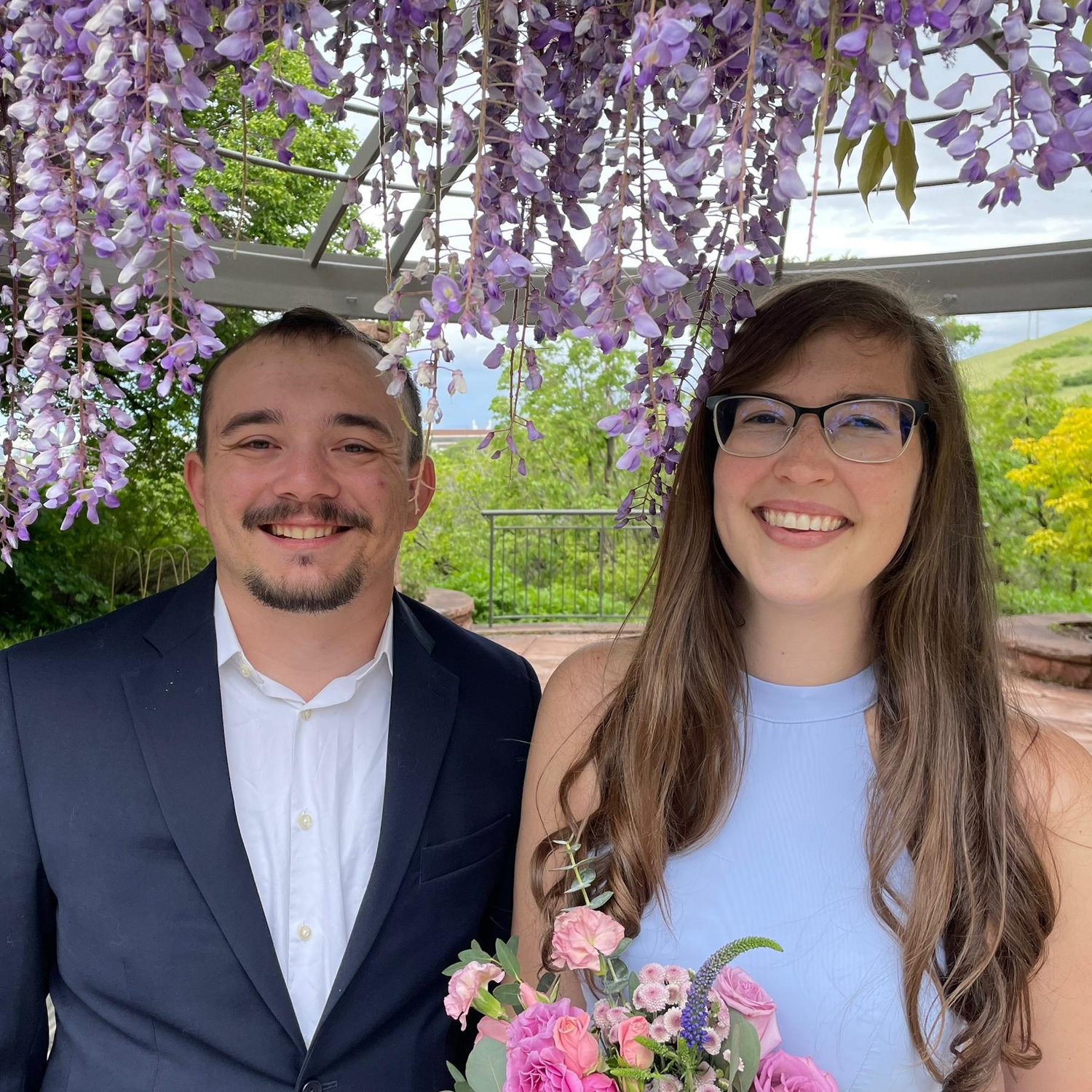 This is just a pretty picture of us from a friend’s wedding.