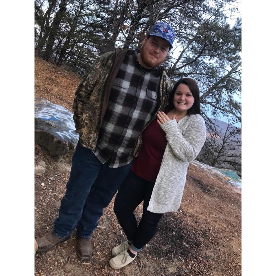 This day was the best day of my life. He took me to the Aquarium and Buffalo Wild Wings. Then he took me to the Lookout Bluff in Graysville and popped the question. He was so nervous. (: