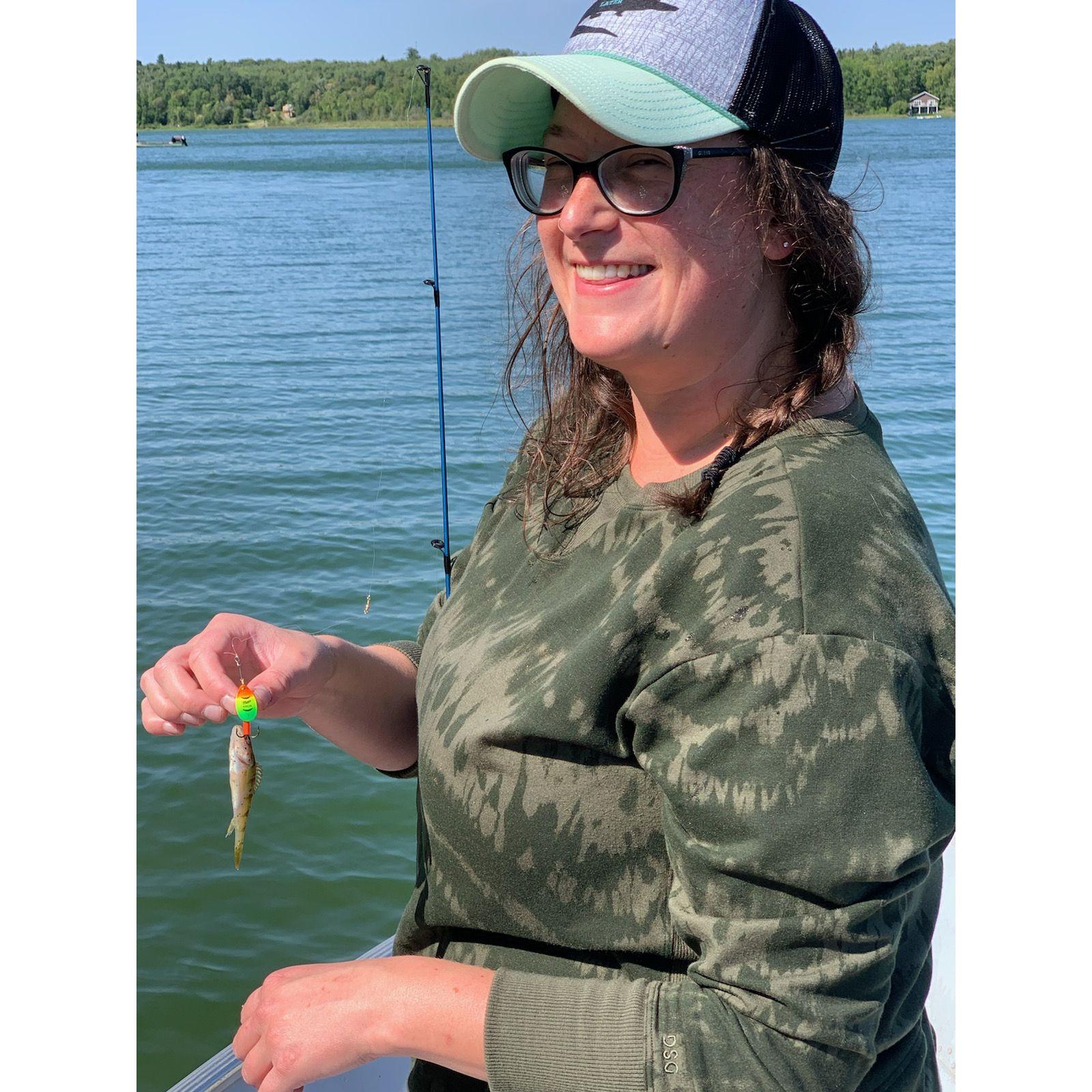 Sarah's first catch! Mason taught me how to fish.