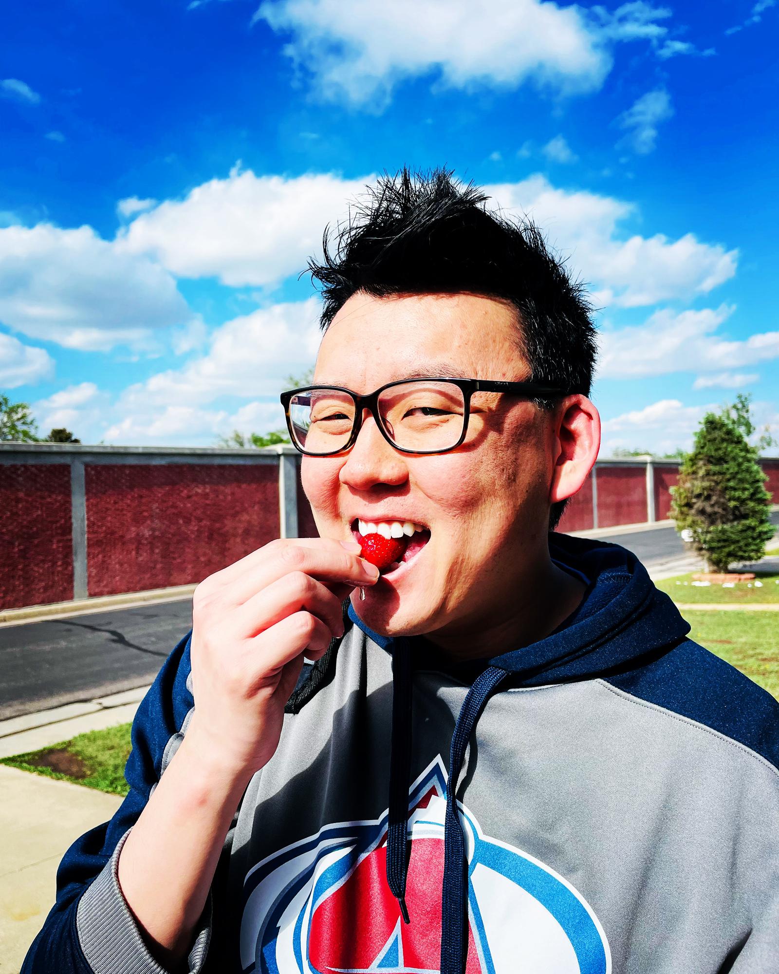 Nick enjoying strawberries at Shawna’s place