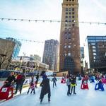 ICE SKATING AT DOWNTOWN DENVER RINK AT SKYLINE PARK
