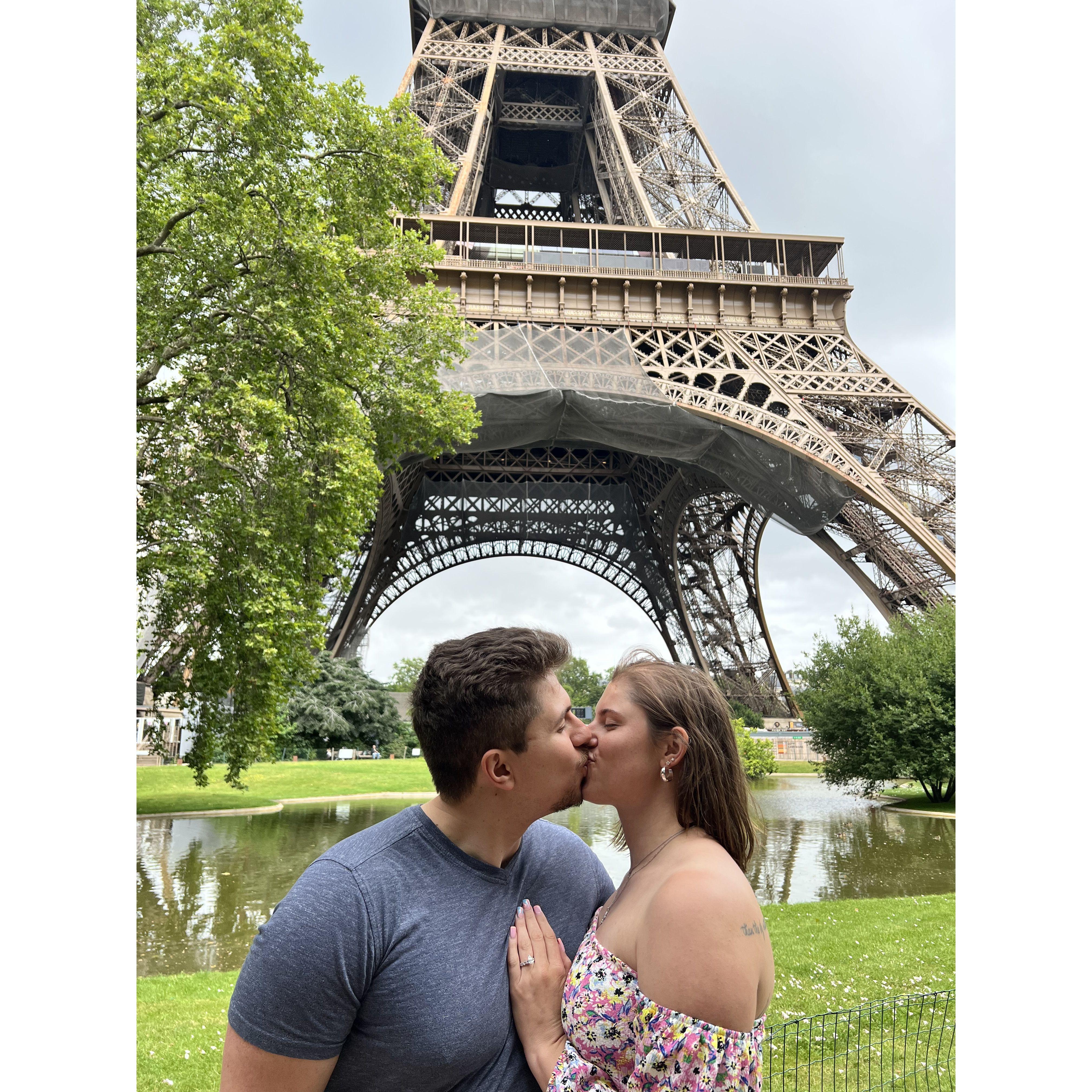 We just got engaged kiss in front of the Eiffel Tower.