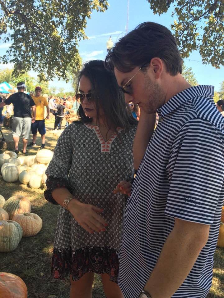 Making important decisions on Pumpkins.  Wings Pumpkin Patch 2017