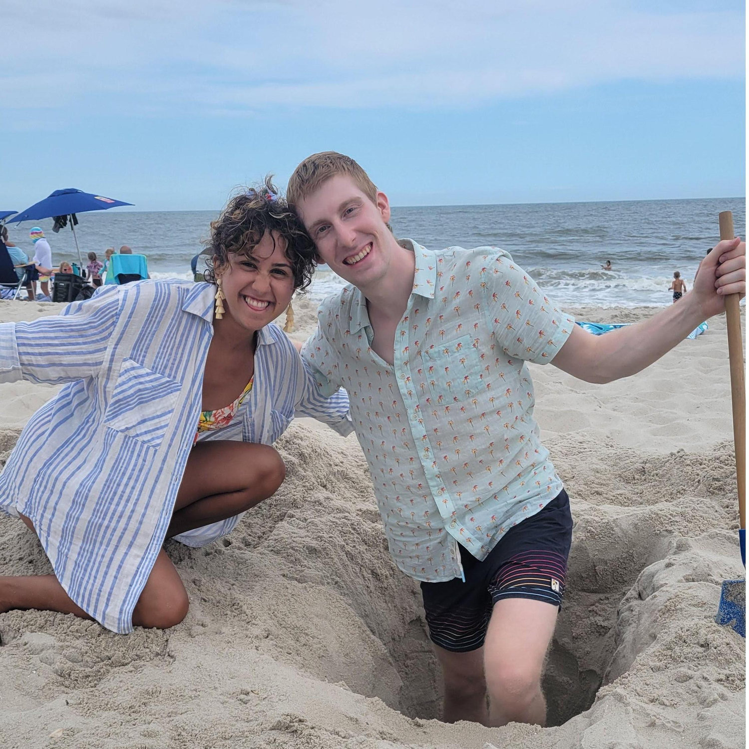 July 2022 -- we like to dig holes in the sand