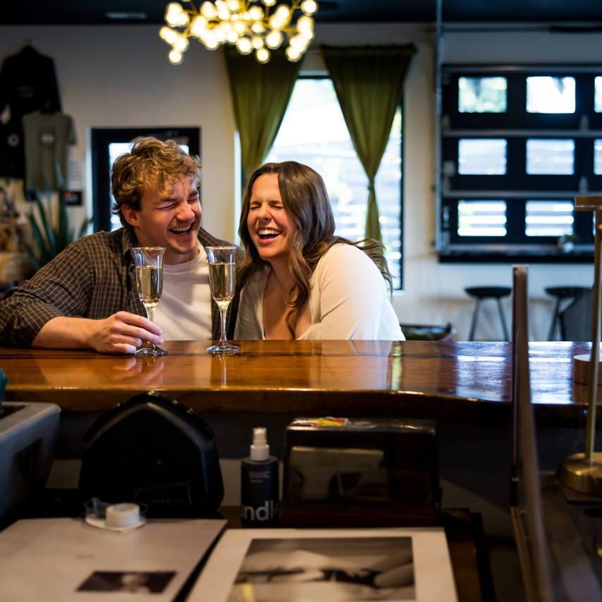This was taken at one of our favorite local restaurants, Stylus, on our incredible engagement photoshoot with our photographer!