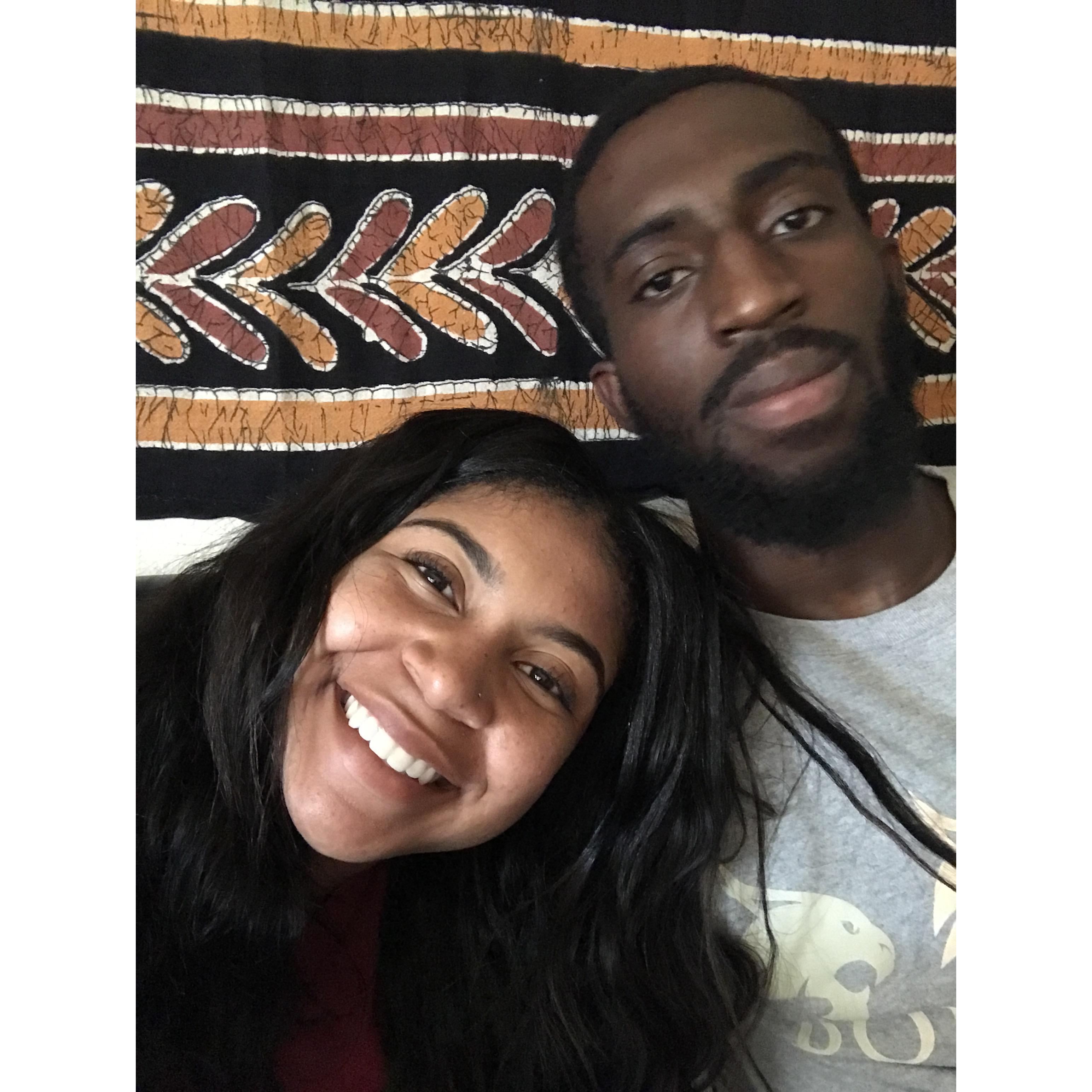 Our very, very first photo together.
P.S. That tapestry is still hanging in what will now be our first place together!