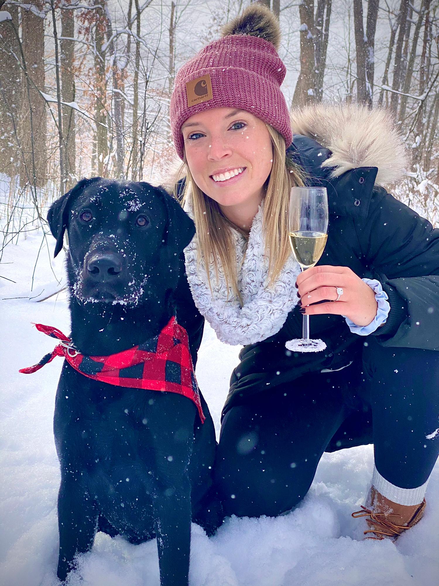 Newly and happily engaged on a snowy Christmas morning! Oscar loving the snow!
