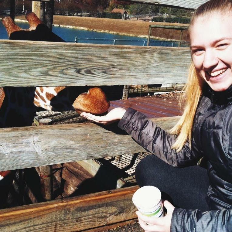 Ashley visiting the giraffes while on one of our early dates.