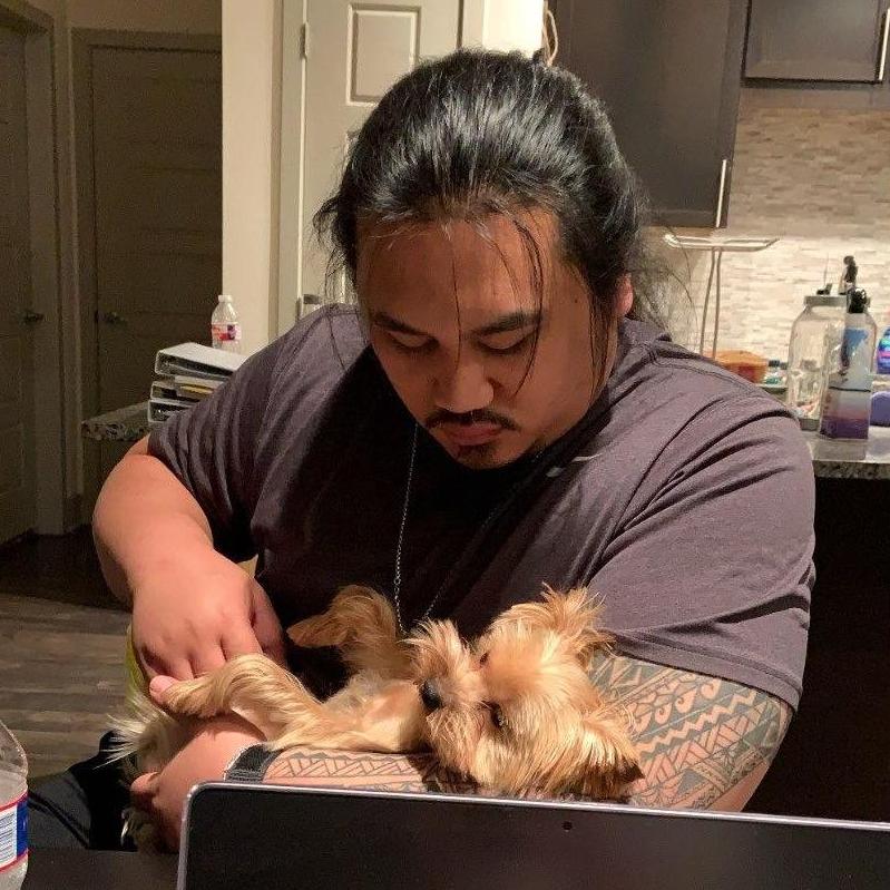 He won't admit it, but he loves our sweet doggo!