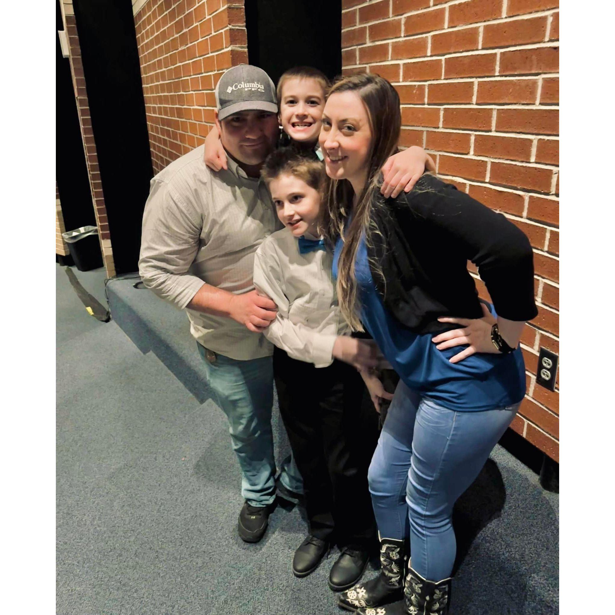 ... and in the auditorium for Corbin's choir and band concerts, supporting his musical talents.