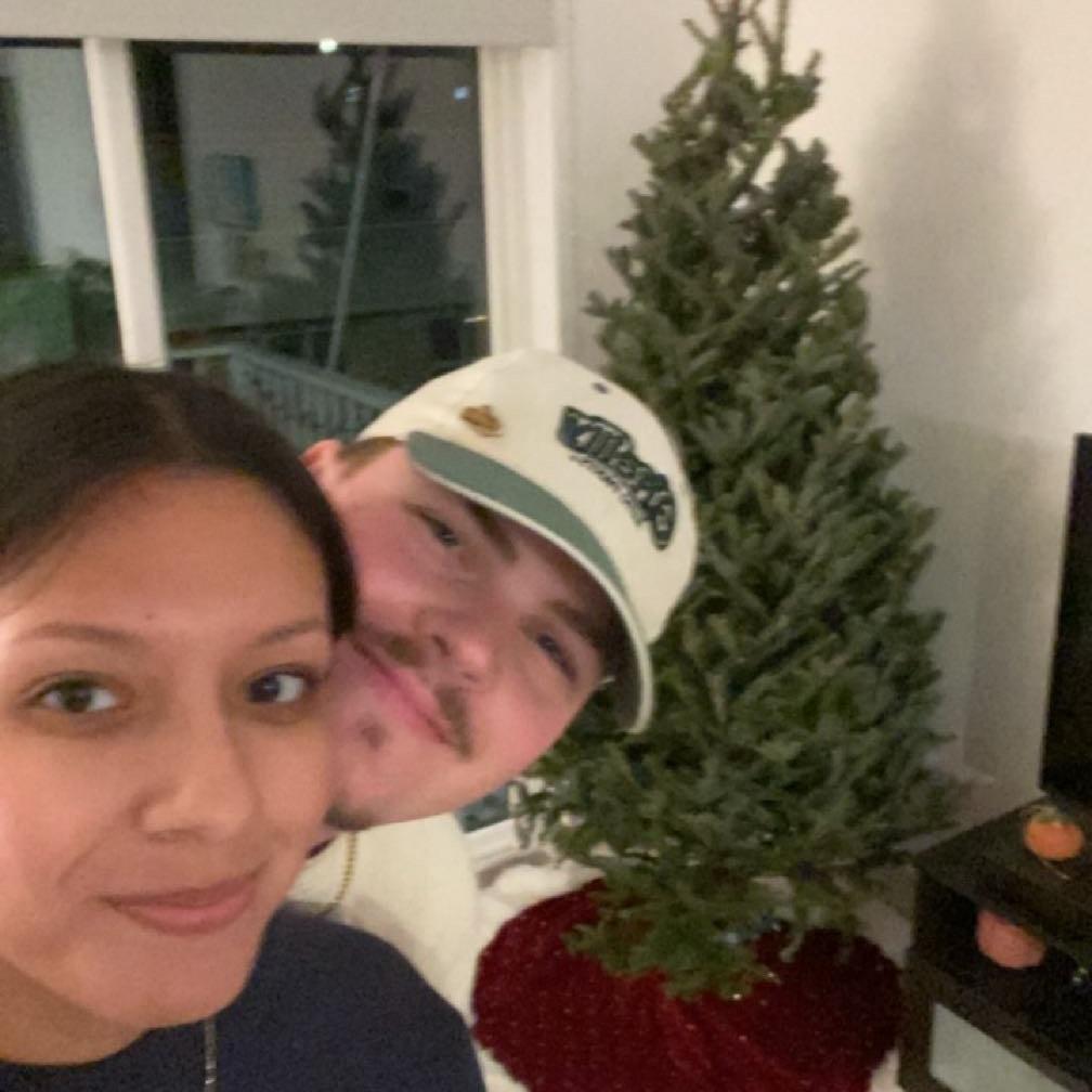 Our first apartment together & our first real Christmas tree together!