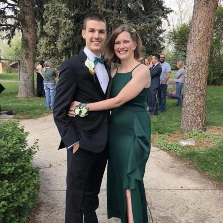 Senior year prom at Wings Along the Rockies. We got a limo and 18 friends to come along to make it a night to remember!
