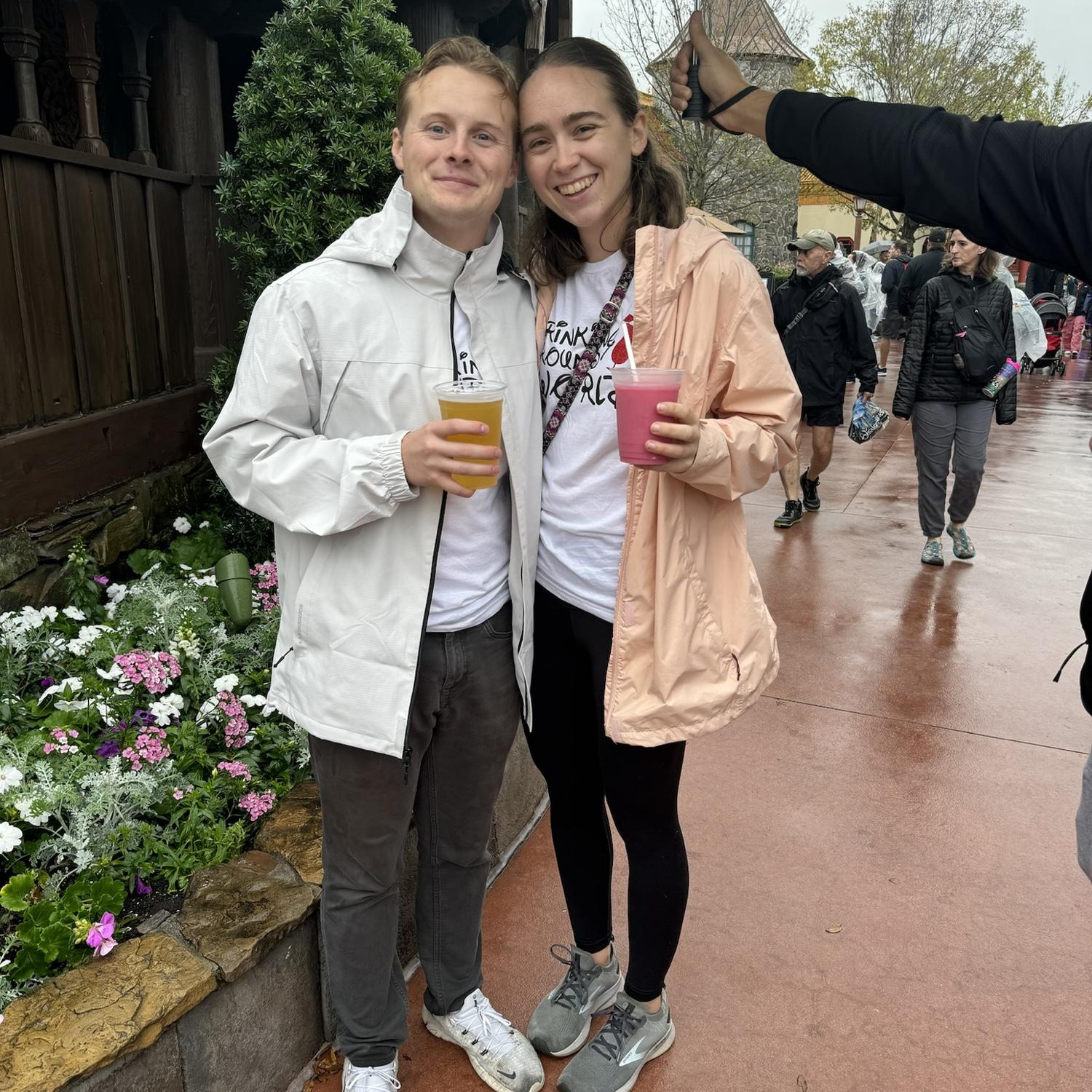 Drinking around the world at Epcot...This photo was in "China". It was cold (at least for Florida) and rainy...and that is a frozen beverage...