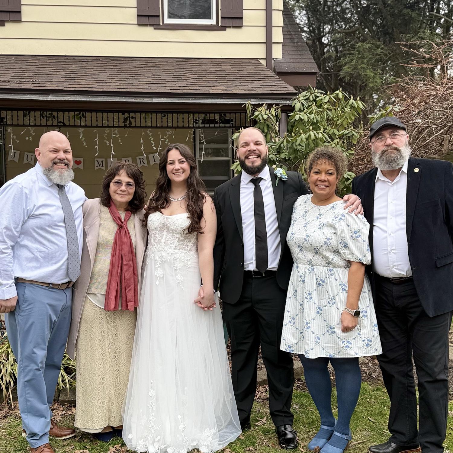 Our parents! The dads stood on opposite sides of their wives, showing that we are all family now