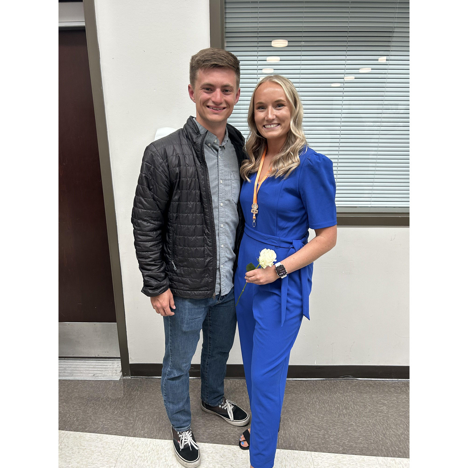 Skyler supporting Lexi on her BSN-RN pinning ceremony