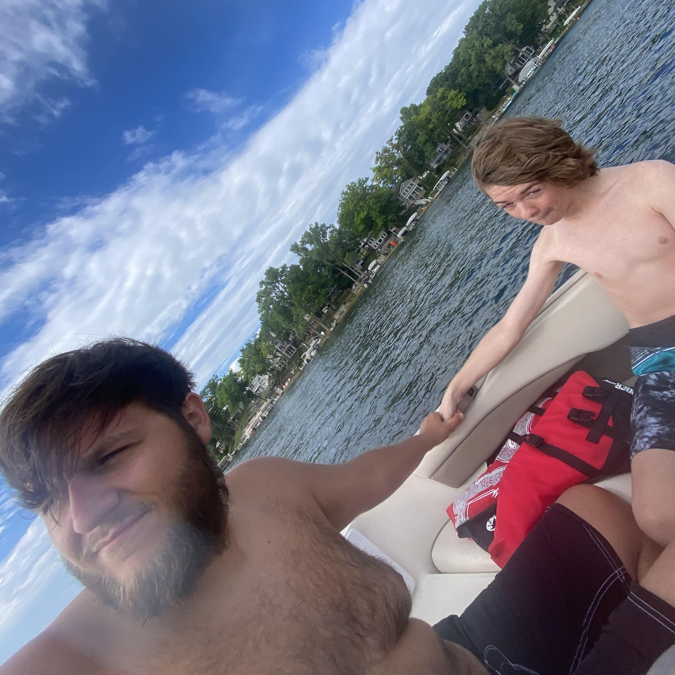 Ethan and Will on the boat
