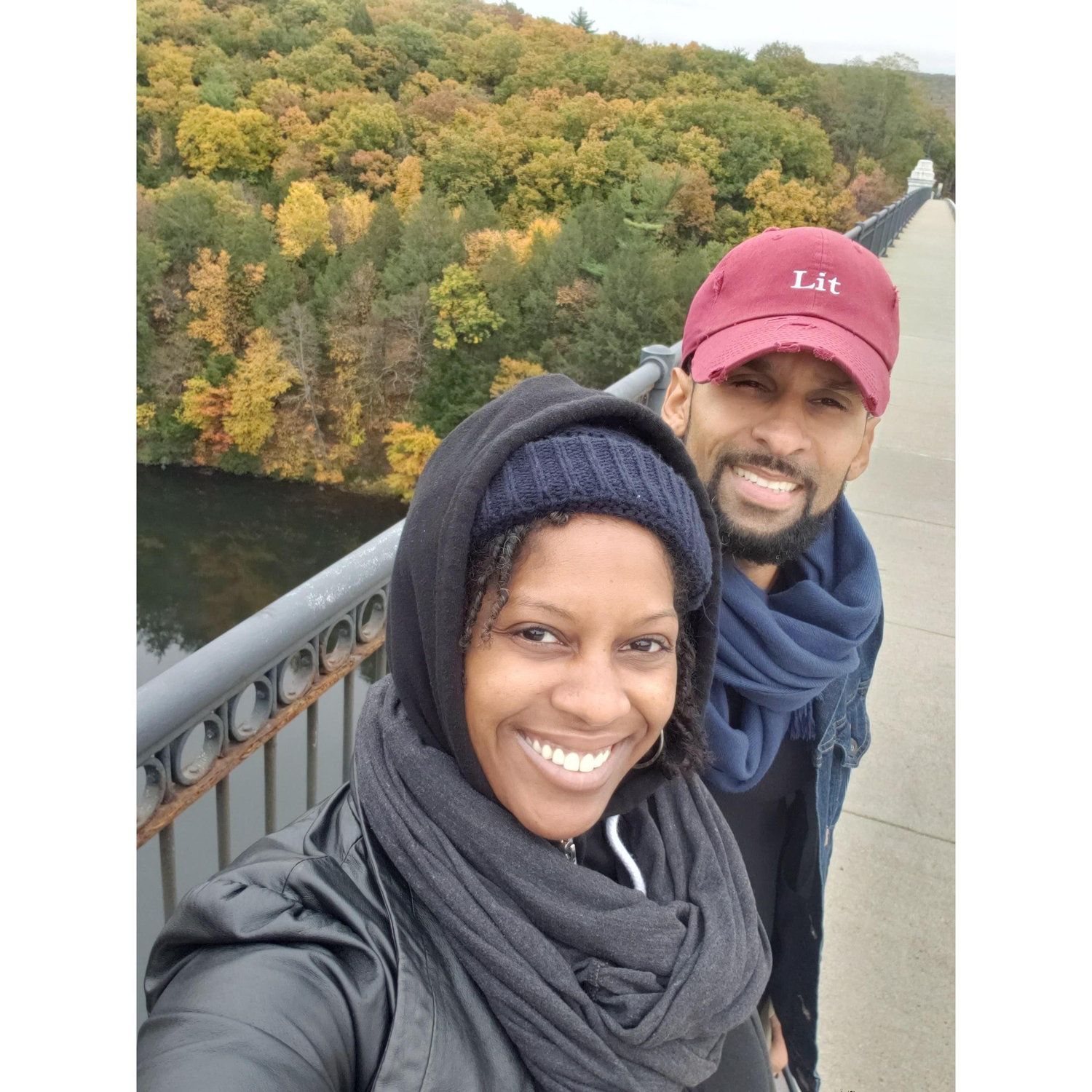 We travel well together and a lot! This is us on one of our favorite bridges in Massachusetts. Isn't the foliage beautiful?!