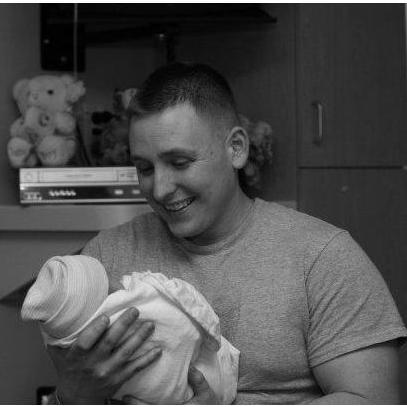 January 2010 - Welcome baby boy. (No photos of us together, so chose my favorite one from that day)