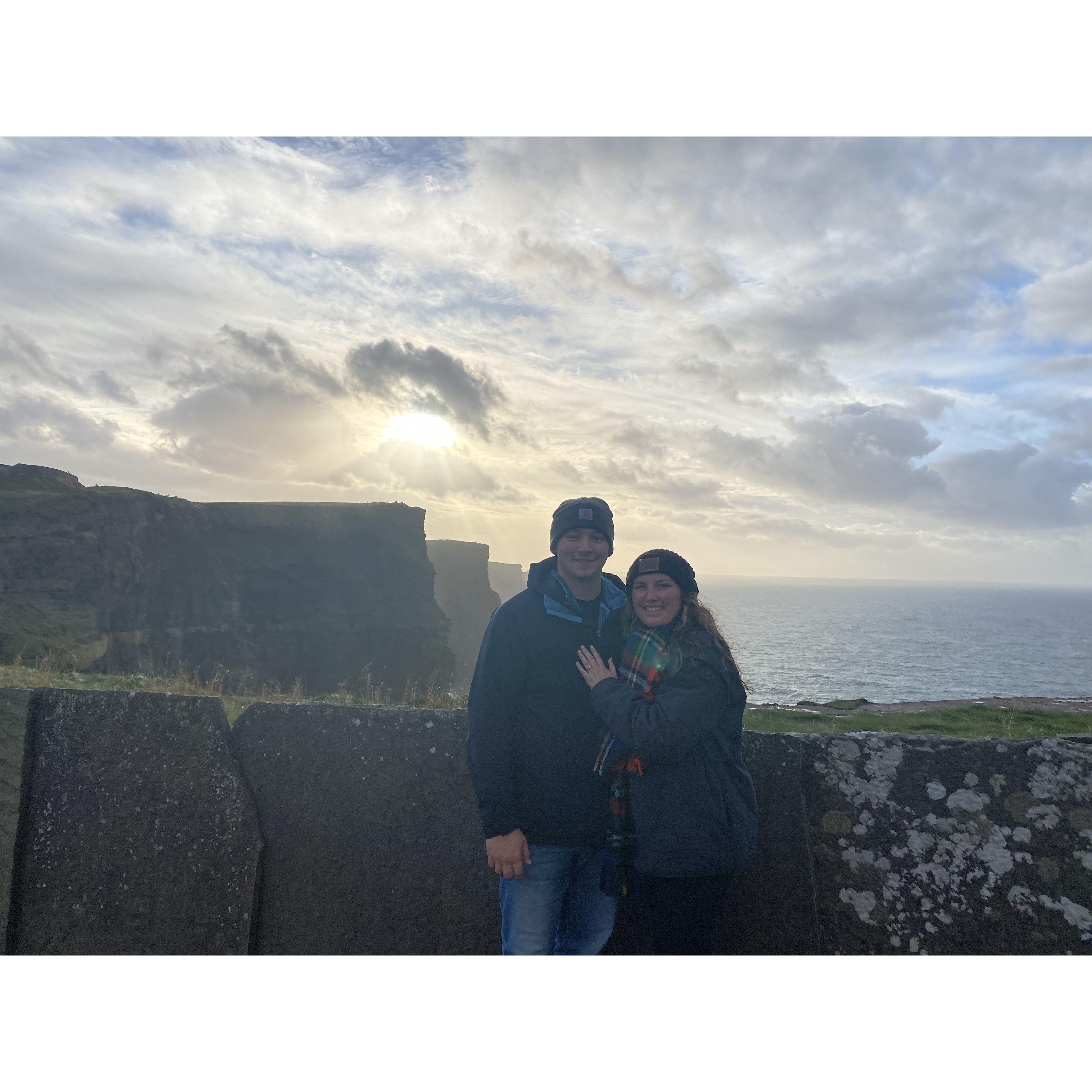 Soon after Phil proposed a kind stranger saw that they were trying to take selfies together and offered to take a photo for them!