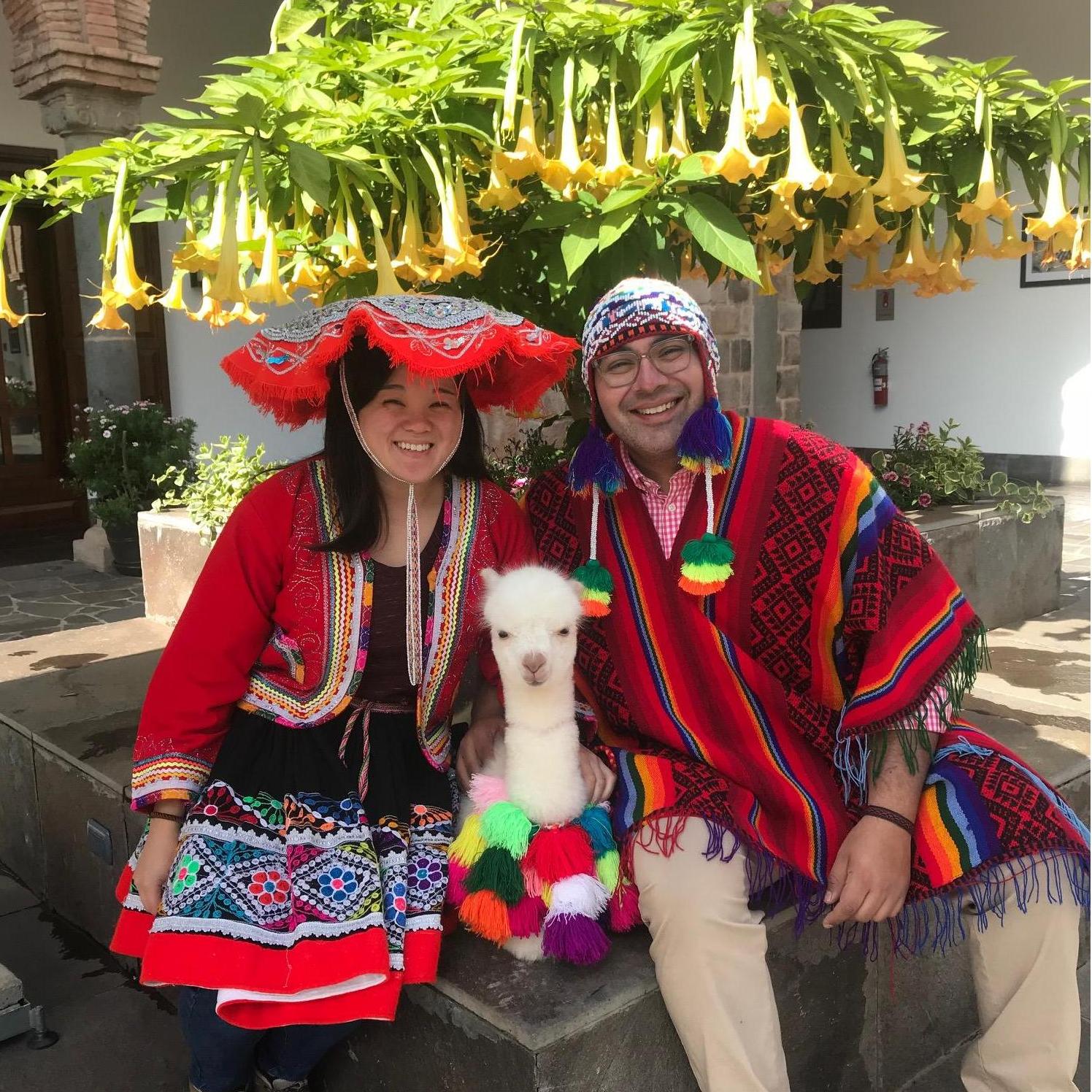Us with Panchita the llama!!! This is one day before the altitude sickness got Jose real good.