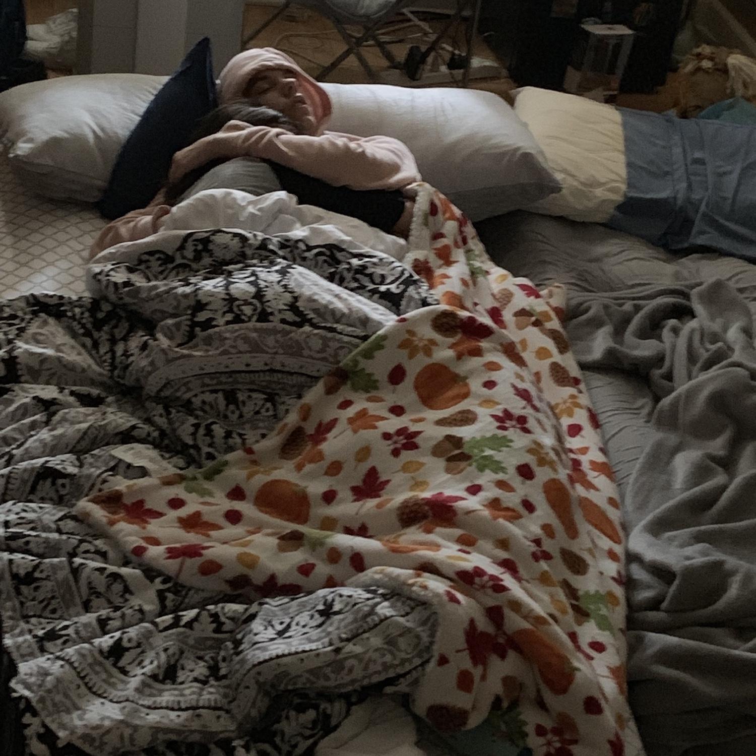 Everyone say "Thank you, Tayler" for capturing this moment of us sleeping on the floor of our dorm room