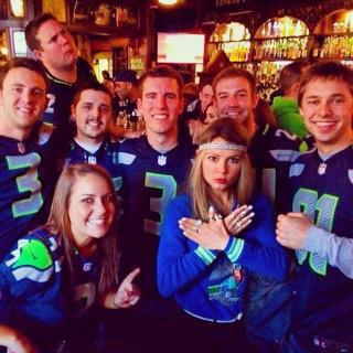 Rooting for the hawks always- Trevor with friends Megan, Morgan, Jordan, Clay, Nick and David at their favorite pub watching Sunday football.