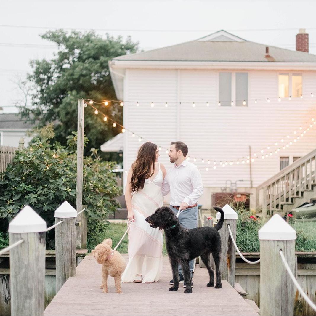 We ended our engagement photos at the spot where we got engaged... home on our dock with our pups!