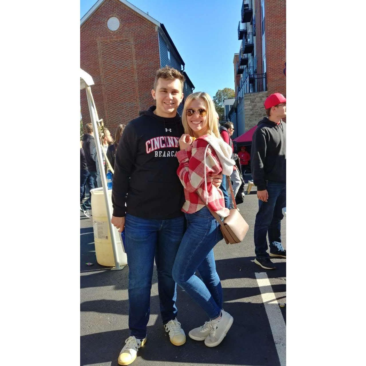 At UC Homecoming (peep Anna holding the chicken tender)